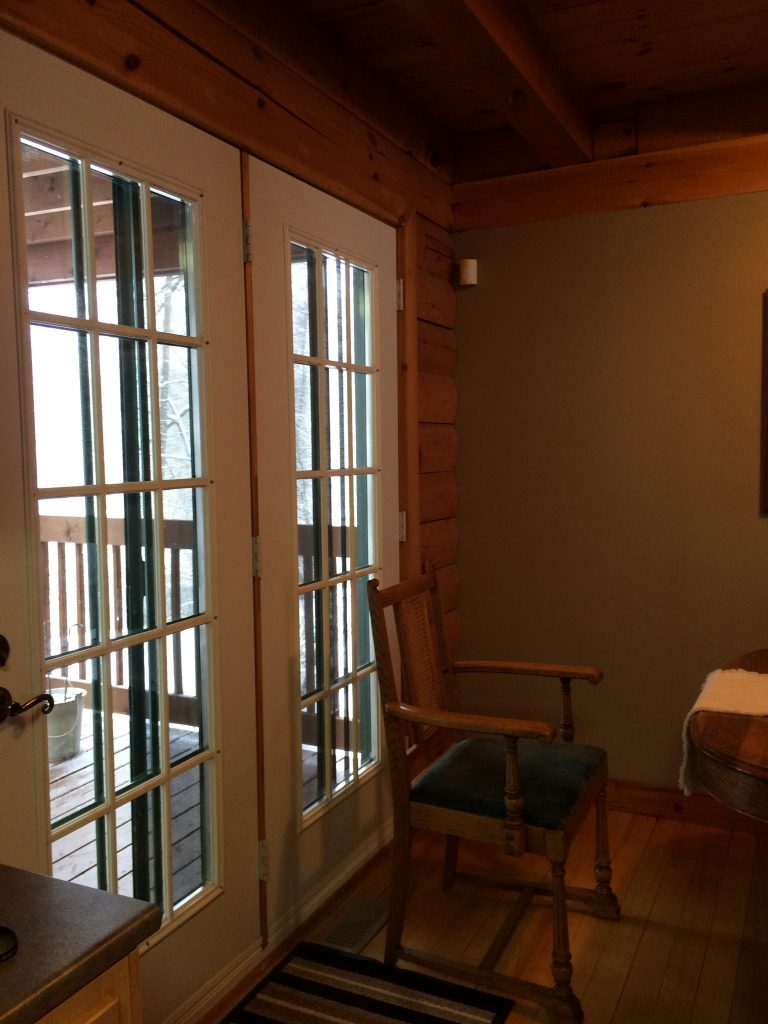 White Steel doors in a log cabin, sheridan interiors, interior designer cornwall, interior designer ottawa, K6H 6M4 , k1k 4h9