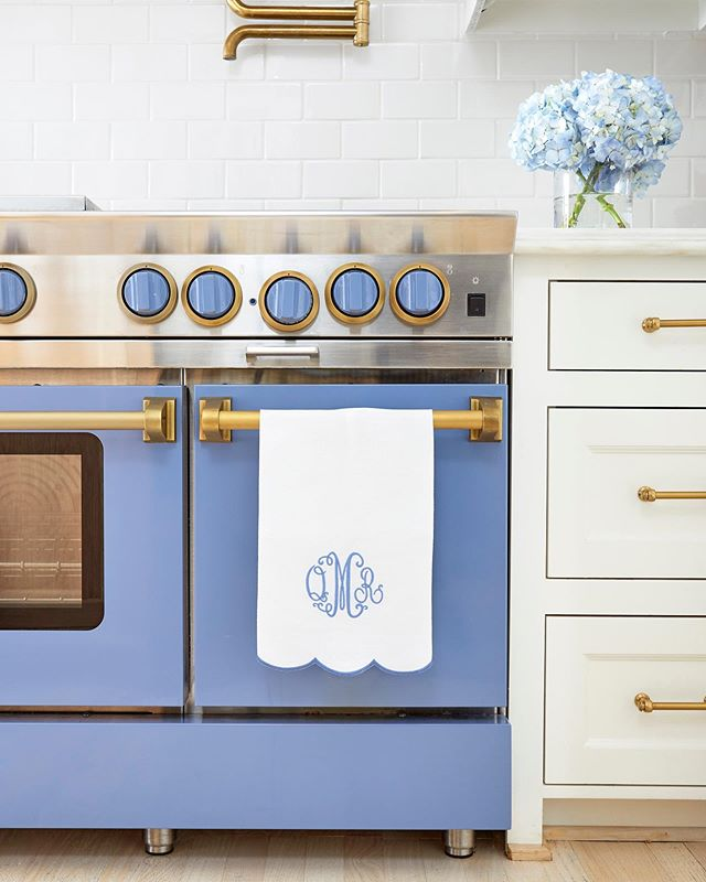 french range, blue range, european appliances, blue and gold, pot filler, blue hydrangeas, white kitchen, kitchen design, sheridan interiors, interior designer cornwall, interior designer ottawa