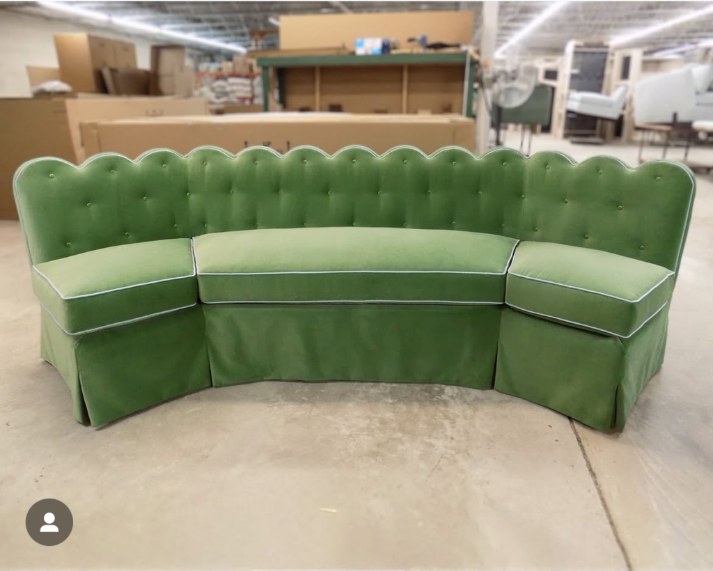Dining banquette in plush green velvet with scalloped back detail and contrasting welting.  Sheridan Interiors, luxury interior design for Cornwall, Ottawa, and Eastern Ontario.  