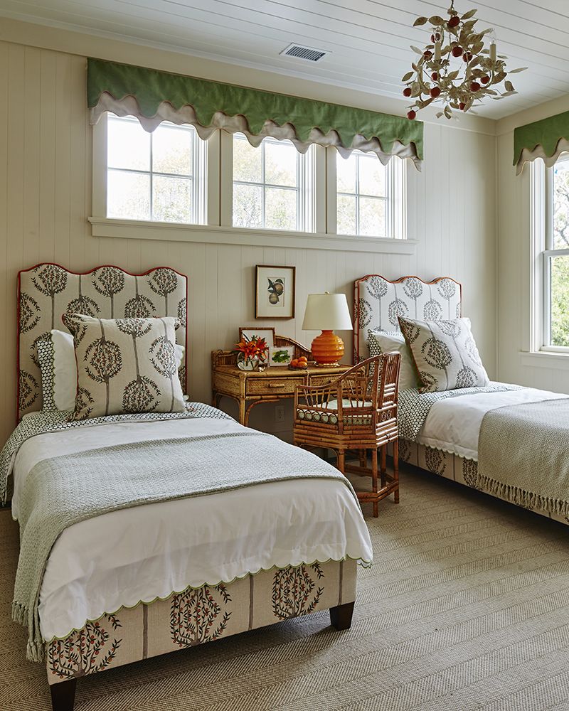 Country-style bedroom with twin beds with scallop detailed headboard. Sheridan Interiors, luxury interior designer serving Ottawa, Cornwall and Eastern Ontario.  