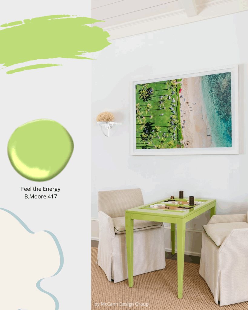 Small game table in a vibrant green with small upholstered armchairs, and colourful beach scene artwork above. game room design ideas, game room decor, interior designer cornwall, interior designer ottawa, sheridan interiors B.Moore 417