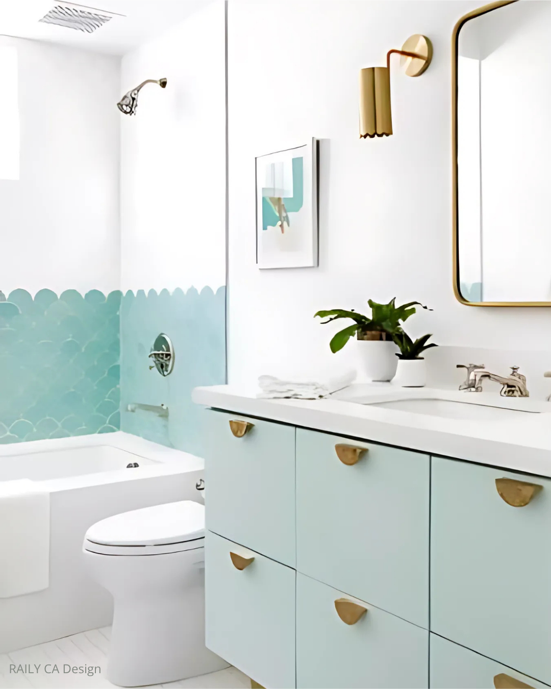 Contemporary bathroom with soft green vanity, gold hardware, and tub surround in cool green and white scalloped tiles. Sheridan Interiors, interior designer cornwall, interior designer ottawa, bathroom designer cornwall, bathroom designer ottawa
