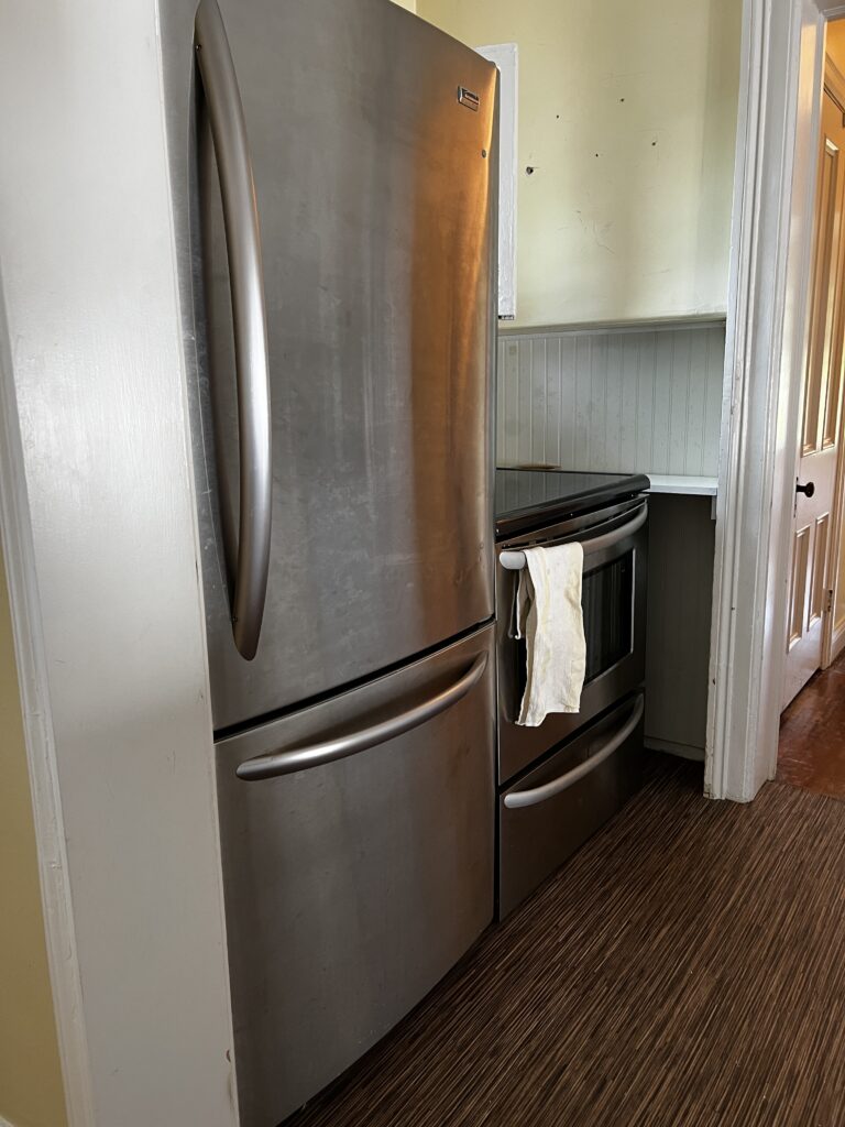 Before view of small kitchen and dining room spaces