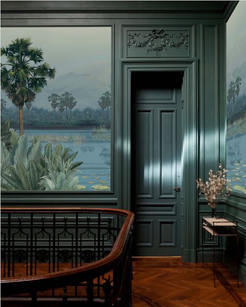 Dark green paneled Hallway and stairwell with custom millwork and moody scenic wallpaper mural.  Sheridan Interiors, Ottawa, luxury interior designer also serving Cornwall and surrounding areas